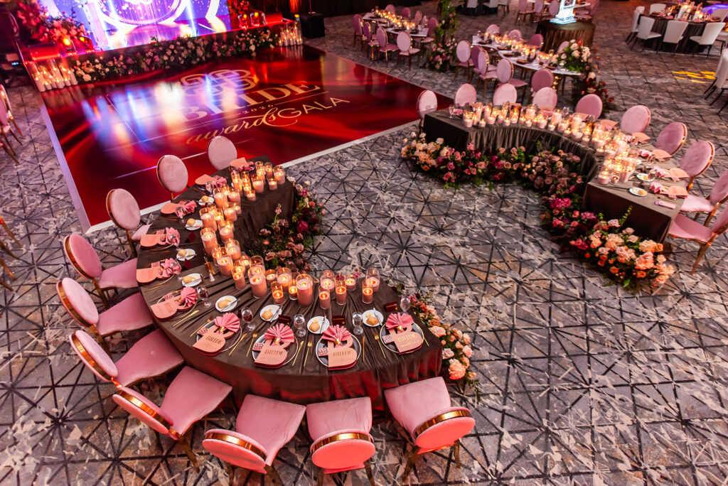 Luxury Black Bride Gala reception featuring custom gold foil menus and table stationery by Sherry Green Designs with elevated candlelit tablescape and dramatic event styling