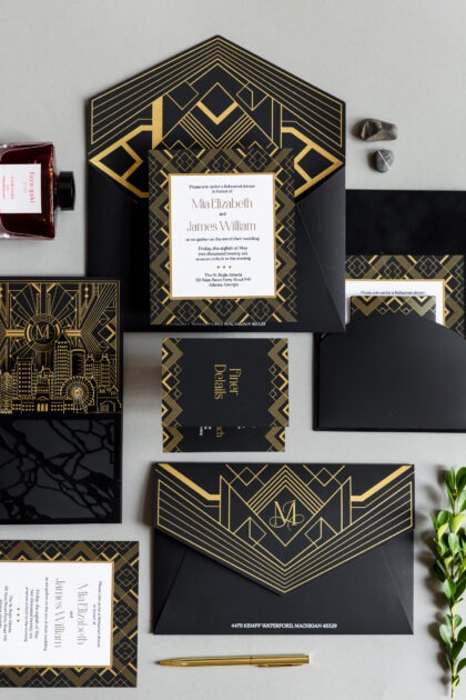 Luxury black and gold Art Deco wedding invitation suite with Atlanta skyline illustration and foil detailing by Sherry Green Designs