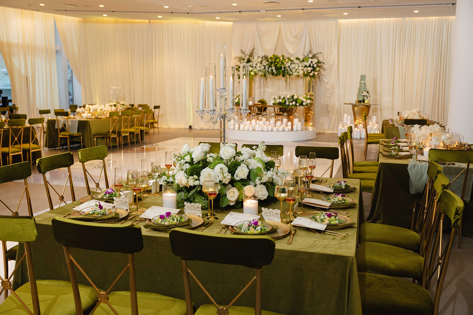 Miami wedding reception design for planners featuring cohesive tablescape and table stationery with gold foil details by Inked Green Designs