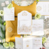 Luxury wedding invitation suite with embossed floral details, custom venue illustration, ornate monogram, layered inserts, and elegant gold foil accents designed by Sherry Green Designs for planners and sophisticated wedding celebrations