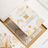 Luxury RSVP wedding card featuring intricate gold foil floral illustrations, butterflies, custom QR code, and elegant black-tie wedding stationery styling